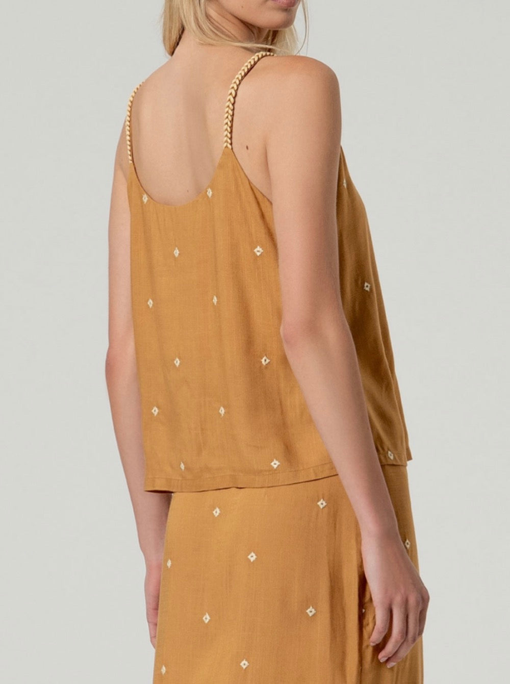 Top ricamato Surkana