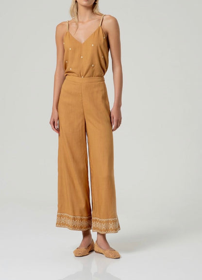 Pantaloni ricamati