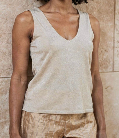 Top a spalline con scollo a V Surkana