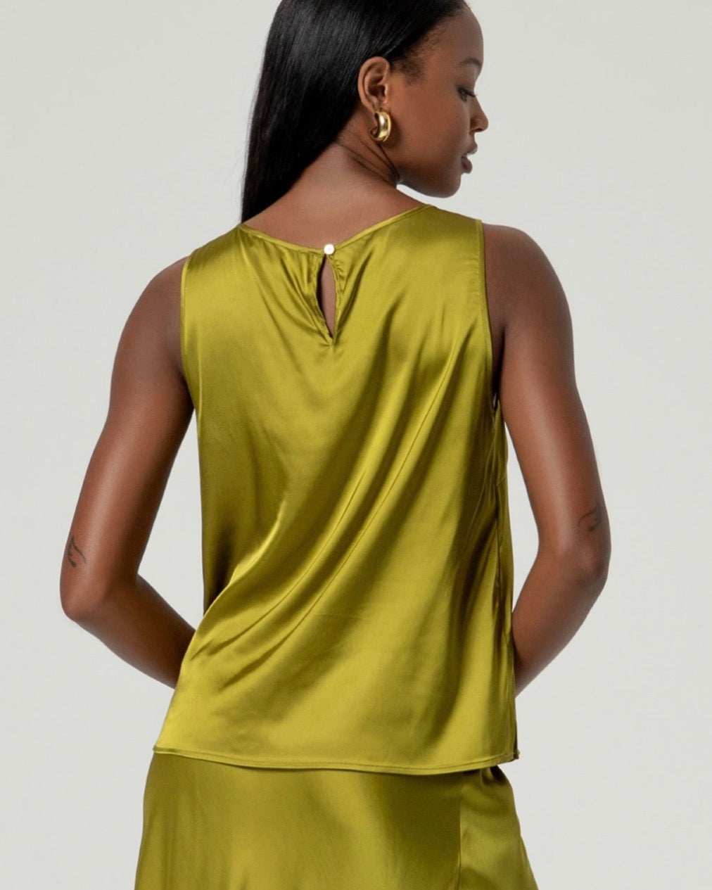Top a spalline con scollo a V